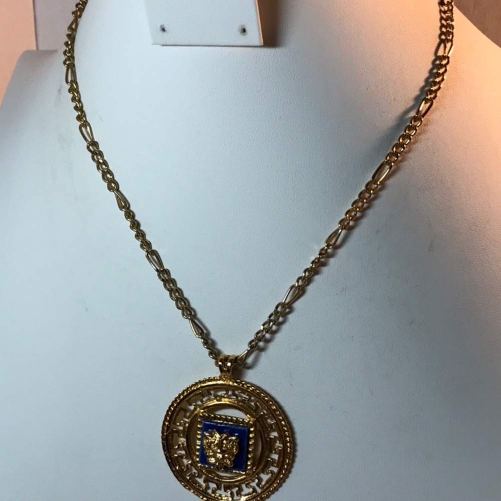 Round pendant necklace, gold tone, blue accent square trimmed gold tone